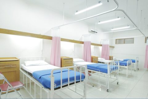 empty hospital bed inside room