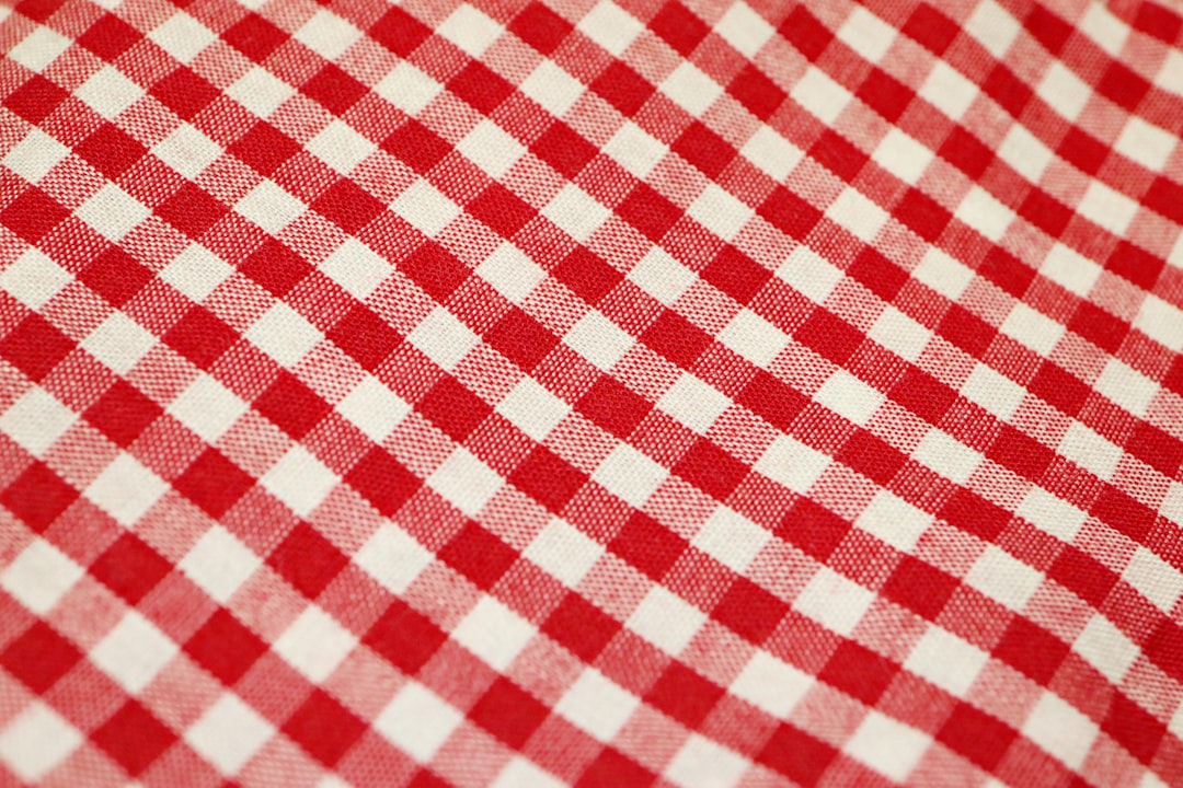 red and white checkered textile