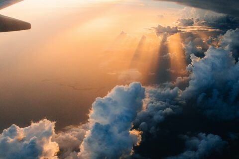 airplane on sky during golden hour