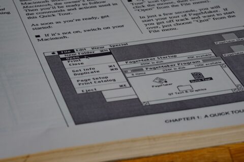 white printer paper on brown wooden table