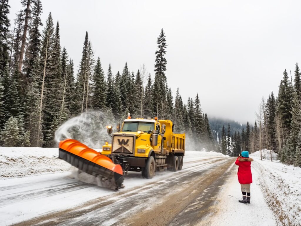 yellow dump truck on focus photography