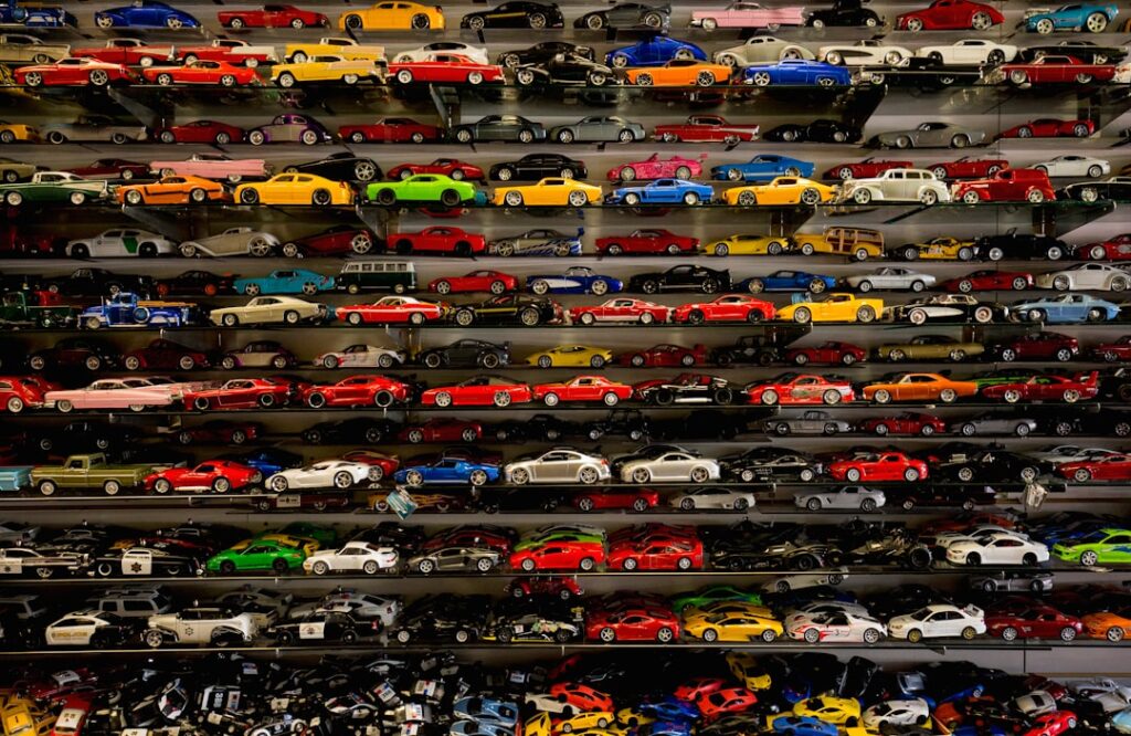 die-cast car collection on rack