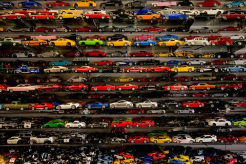 die-cast car collection on rack