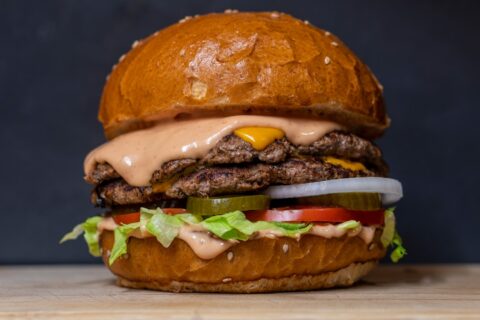 burger with lettuce and tomatoes