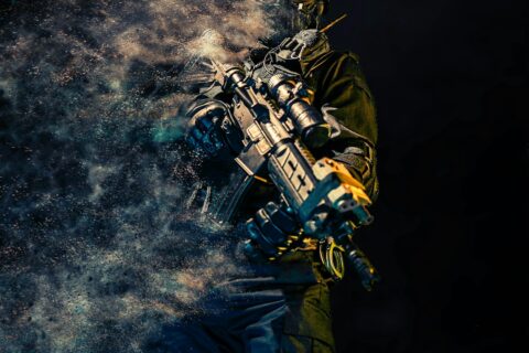 man holding rifle wallpaper