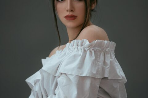 woman in white off shoulder dress
