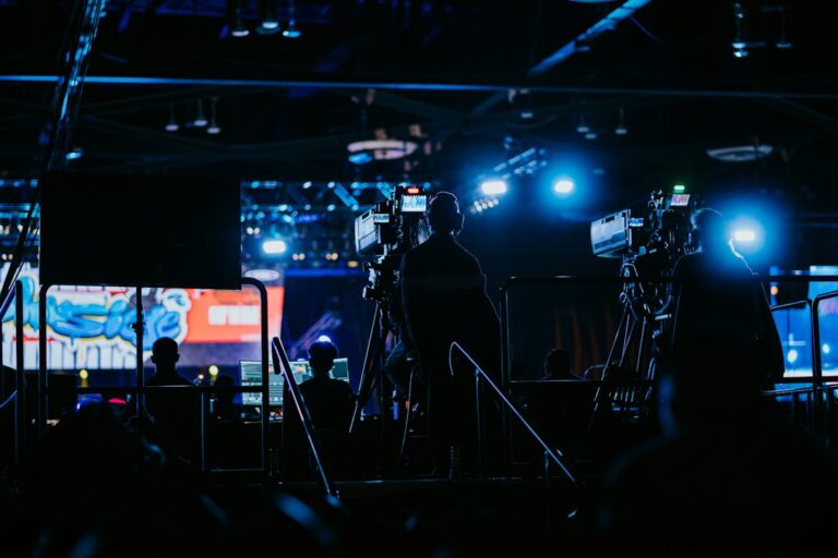 a group of people standing in front of a camera