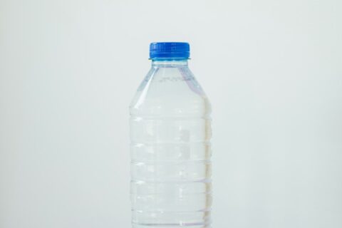clear plastic bottle on white table